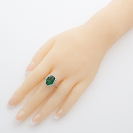 Strieborný prsteň - zelený oválny zirkón, číre okrúhle zirkóny | Argento.sk