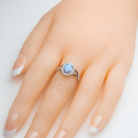 Strieborný prsteň so svetlomodrým opálom a zirkónmi